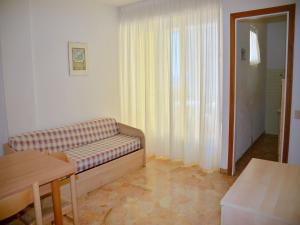 A seating area at Renewed flat with seaview - Beahost