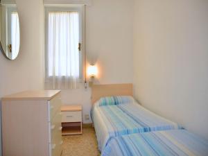 A bed or beds in a room at Renewed flat with seaview - Beahost