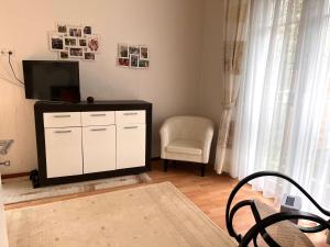TV a/nebo společenská místnost v ubytování Casa Rehman