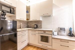 Køkken eller tekøkken på Maisonnette Biscarosse + 15 billeder