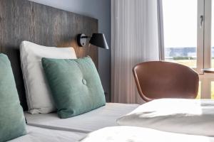 Letto o letti in una camera di Comwell Middelfart
