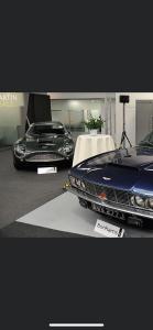 a view of a car on display at a car show at The Coach House at The Bull Inn in Milton Keynes