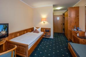 TV a/nebo společenská místnost v ubytování Hotel Simonshof