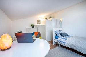 A bed or beds in a room at Il terrazzo sul tramonto