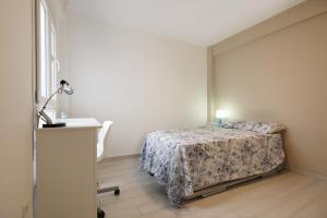 Säng eller sängar i ett rum på Apartment Capuchinos