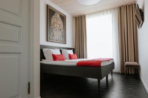 Postel nebo postele na pokoji v ubytování Old Hapsal Hotel