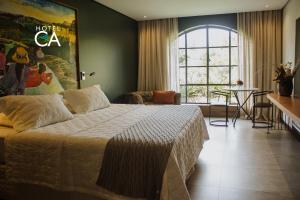 Cama ou camas em um quarto em Hotel Canto das Águas - Roteiro de Charme