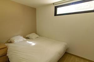Posteľ alebo postele v izbe v ubytovaní Pyla sur mer proche plages appartement avec piscine