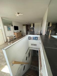 Kuchyňa alebo kuchynka v ubytovaní Appartement duplex Vil’Adonis