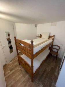 Poschodová posteľ alebo postele v izbe v ubytovaní Appartement duplex Vil’Adonis