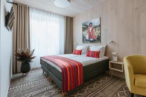 Postel nebo postele na pokoji v ubytování Old Hapsal Hotel