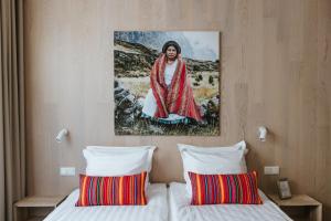 Postel nebo postele na pokoji v ubytování Old Hapsal Hotel
