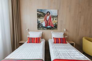 Postel nebo postele na pokoji v ubytování Old Hapsal Hotel