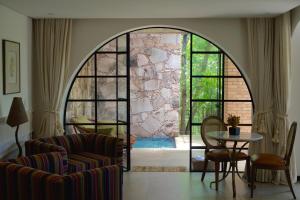 Uma área de estar em Hotel Canto das Águas - Roteiro de Charme