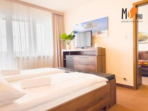 Krevet ili kreveti u jedinici u objektu Apartament hotelowy Nad Parsętą by MS Pro