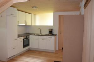 Kuchyň nebo kuchyňský kout v ubytování Ferienhaus Rimsgrund