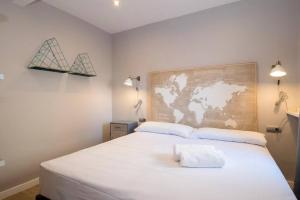 Posteľ alebo postele v izbe v ubytovaní BeBarceloner Sant Andreu Apartments - 3 bedrooms with terrace