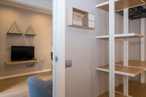 Televízia a/alebo spoločenská miestnosť v ubytovaní BeBarceloner Sant Andreu Apartments - 3 bedrooms with terrace