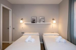 Posteľ alebo postele v izbe v ubytovaní BeBarceloner Sant Andreu Apartments - 3 bedrooms with terrace