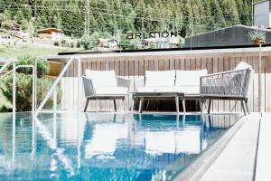 Bazén v ubytování Hotel Arlmont 4 Stern Superior nebo v jeho okolí