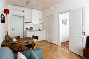 Kuchyň nebo kuchyňský kout v ubytování Old Hapsal Hotel