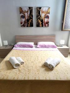 Katil atau katil-katil dalam bilik di My Home Lampedusa