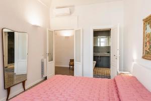 Letto o letti in una camera di 2 Soru Ortigia Holiday Home - Attico con terrazza