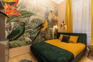Posteľ alebo postele v izbe v ubytovaní E12 Boutique Apartments