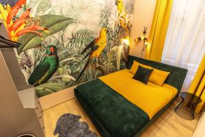 Posteľ alebo postele v izbe v ubytovaní E12 Boutique Apartments
