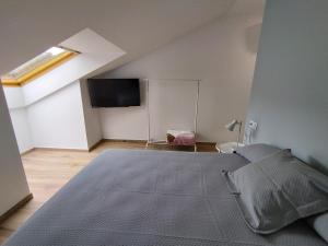 Łóżko lub łóżka w pokoju w obiekcie Pensión Residencial Platas