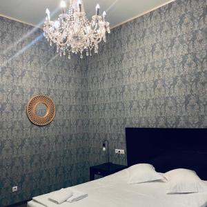 Posteľ alebo postele v izbe v ubytovaní Vila Vidalis
