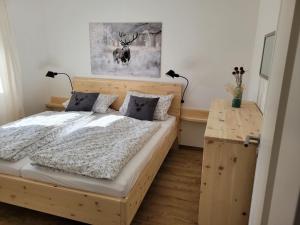 Postel nebo postele na pokoji v ubytování Ferienwohnung Klauserhof
