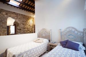 En eller flere senge i et værelse på Baglio Maranzano - Marietta