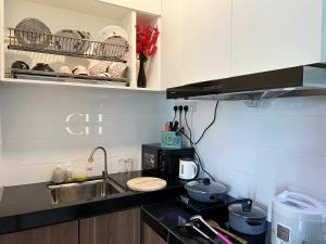 Afbeelding uit fotogalerij van Kuching Apartment TT3 SOHO Tabuan Tranquility C6-12 in Kuching