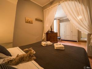 Posteľ alebo postele v izbe v ubytovaní La Casa di Eio