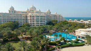 an aerial view of a resort with a swimming pool at Kempinski Hotel & Residences Palm Jumeirah in Dubai