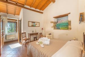 Posteľ alebo postele v izbe v ubytovaní Agriturismo Cappellese + 37 fotografií