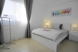 Postel nebo postele na pokoji v ubytování Villa Patricia Playa Blanca + 12 fotografií