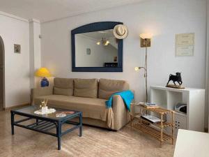 Posedenie v ubytovaní Acogedor duplex en la zona del Golf