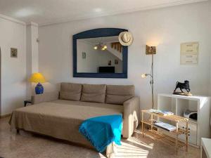 Posedenie v ubytovaní Acogedor duplex en la zona del Golf