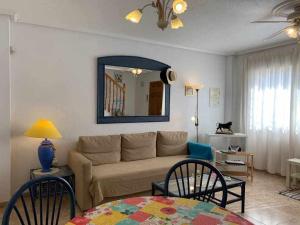 Posedenie v ubytovaní Acogedor duplex en la zona del Golf