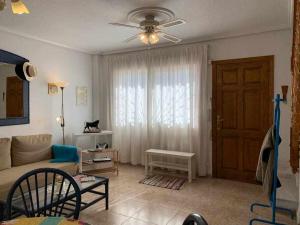 Posedenie v ubytovaní Acogedor duplex en la zona del Golf