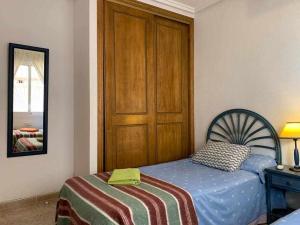Posteľ alebo postele v izbe v ubytovaní Acogedor duplex en la zona del Golf
