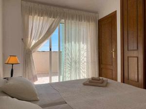 Posteľ alebo postele v izbe v ubytovaní Acogedor duplex en la zona del Golf