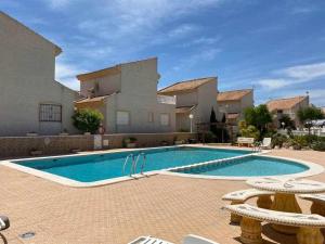 Bazén v ubytovaní Acogedor duplex en la zona del Golf alebo v jeho blízkosti