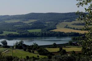 a view of a lake in the hills at Podere Calledro in Narni