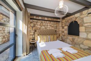 Postel nebo postele na pokoji v ubytování Alp Pasa Fiore Garden Suites - Special Class