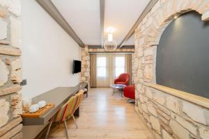 TV a/nebo společenská místnost v ubytování Alp Pasa Fiore Garden Suites - Special Class