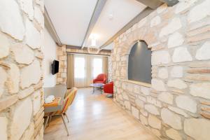 TV a/nebo společenská místnost v ubytování Alp Pasa Fiore Garden Suites - Special Class
