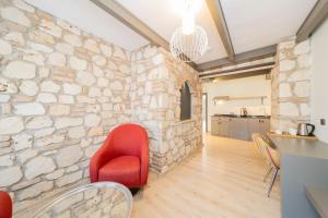 Kuchyň nebo kuchyňský kout v ubytování Alp Pasa Fiore Garden Suites - Special Class